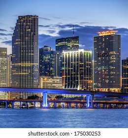 CIty of Miami Florida, illuminated business and residential buildings and bridge on Biscayne Bay 