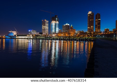 City of Milwaukee Wisconsin at Night lakefront lights reflection in lake Michigan