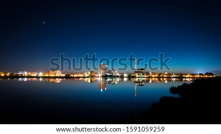 City of Moncton New Brunswick Skyline reflecting in pond