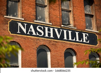 City of Nashville Tennessee USA sign painted on the side of a brick building