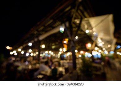 City Night Light Blur Bokeh At Outdoor Restaurant