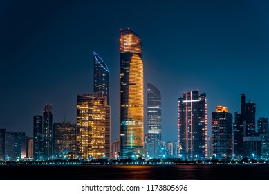 City night view of Abu Dhabi business financial district. United Arab Emirates, middle east. Luxury lifestyle.  - Powered by Shutterstock