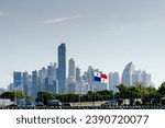 city ​​skyline of panama city skyscrapers with the flag of panama in the foreground