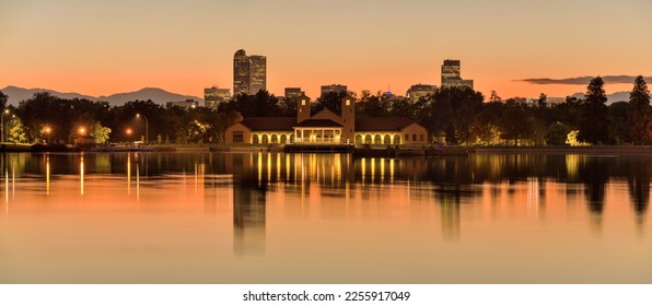 City Park at Dusk - A colorful Autumn dusk view of Ferril Lake in Denver City Park, with front range mountains and landmark skyscrapers in background, at east-side of Downtown Denver, Colorado, USA. - Powered by Shutterstock