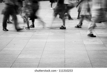 City People Walking On Piazza In Motion Blur