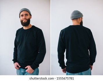 City Portrait Of Handsome Hipster Guy With Beard Wearing Black Blank Hoody Or Sweatshirt With Space For Your Logo Or Design. Front And Back View Mockup