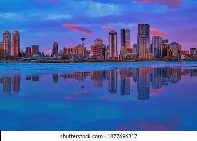 City reflections on ice at sunrise - Shutterstock ID 1877696317