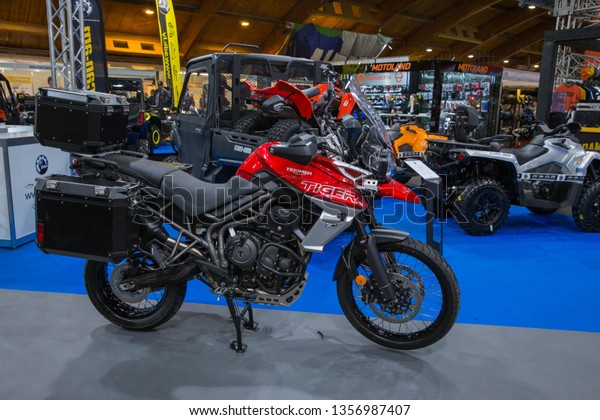 City
Riga, Latvia. Car and motorcycle exibition. Motorcycle Triumph,
peoples and advertising. 29.03.2019 Travel
photo.