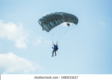 City Riga, Latvian Republic. Avio Show In Honor Of The City Festival. Parachutists Land With Parachutes On Target. 17 August 2019.