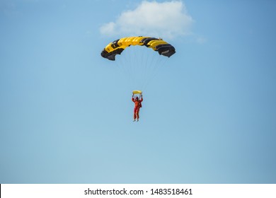 City Riga, Latvian Republic. Avio Show In Honor Of The City Festival. Parachutists Land With Parachutes On Target. 17 August 2019.