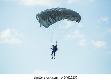 City Riga, Latvian Republic. Avio Show In Honor Of The City Festival. Parachutists Land With Parachutes On Target. 17 August 2019.