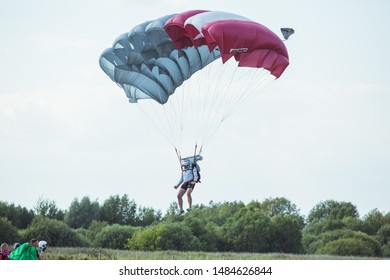 City Riga, Latvian Republic. Avio Show In Honor Of The City Festival. Parachutists Land With Parachutes On Target. 17 August 2019.