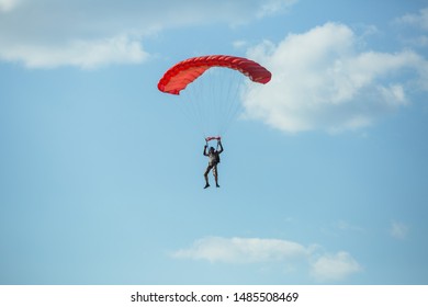 City Riga, Latvian Republic. Avio Show In Honor Of The City Festival. Parachutists Land With Parachutes On Target. 17 August 2019.