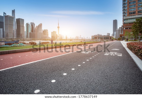The city and the road in the modern office\
building background
