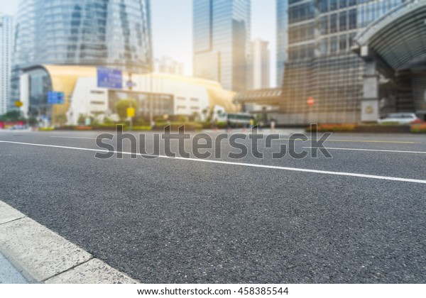 City road with\
moving traffic,shanghai\
china.