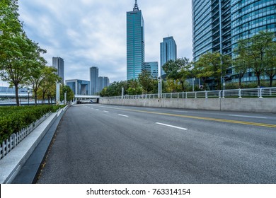 city road through modern buildings in Tianjin - Shutterstock ID 763314154