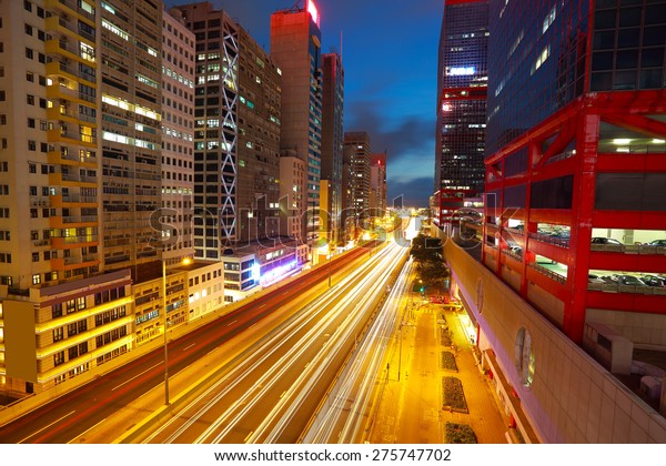 City road tunnels light trails of modern\
landmark buildings backgrounds in\
HongKong