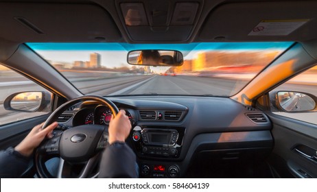 City Road View From Inside Car Natural Light Street And Other Cars Is Motion Blurred