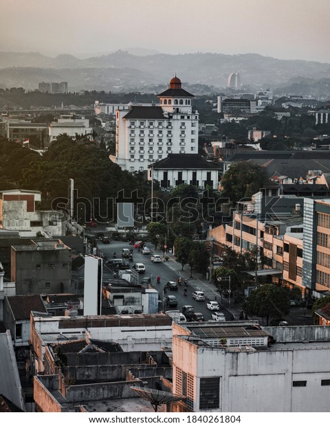city ​​view from the rooftop of pasar\
baru building in the afternoon, Bandung -\
Indonesia