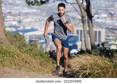 City, runner and man running in nature training, cardio exercise and endurance workout for a marathon. Sports, fitness and healthy athlete on jog on a forest or mountain trail outdoors in summer - Powered by Shutterstock
