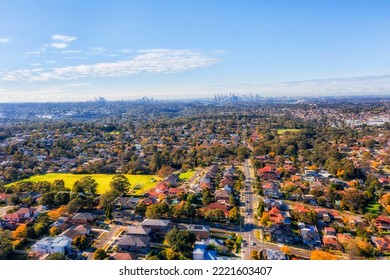 City Of Ryde Local Residential Suburbs On Sydney West In Aerial Cityscape View Towards Distant City CBD Skyline.