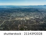 City of San Bernardino, California in San Bernardino Valley with San Bernardino International Airport (SBD) - aerial view 