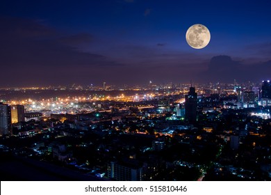 City Scape at night scene with super moon - Shutterstock ID 515810446