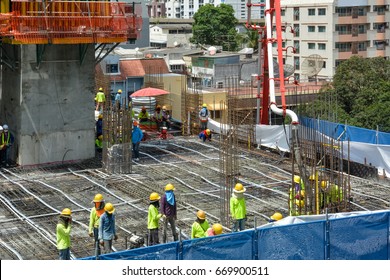 City Scape, Ploenchit-Sukhumvit Area, Worker In Construction High Building In Business Property With Urban Expansion Has Pollution, Transportation, Traffic, Dust Pm.2.5, Noisy. Bangkok,Thailand