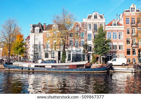 Similar – Foto Bild Architektur niederländischer Häuser und Hausboote am Amsterdamer Kanal