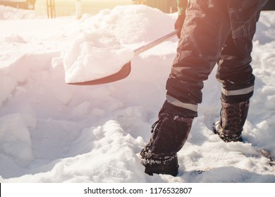 City Service Cleaning Snow Winter With Shovel After Snowstorm Yard. Sunlight