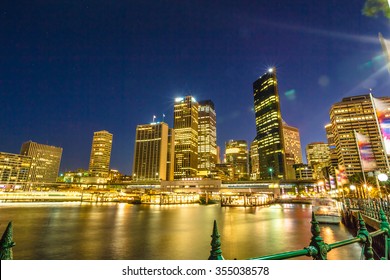 City Skyline At Circular Quay By Night, Sydney, Australia.