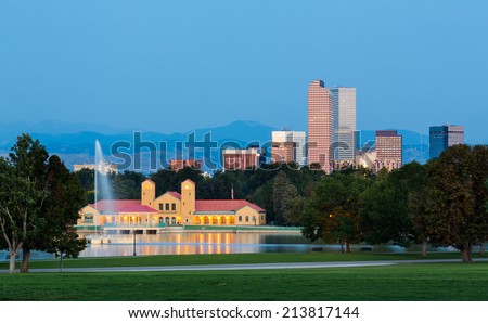 City skyline of Denver Colorado from the City Park taken from front of Science Museum just before sunrise with the fountain and Boathouse and Ferril Lake