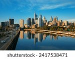 City skyline with historic and modern buildings over river in Philadelphia in Pennsylvania USA 