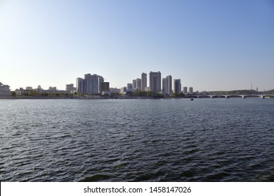 City Skyline Of Pyongyang And Taedong River At Sunset