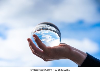 The City Skyline Is Reflected In A Crystal Ball Against A Blue Sky,Norway,Tromso