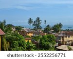 City skyline with sea in background, colourful buildings, Freetown, Sierra Leone, Africa