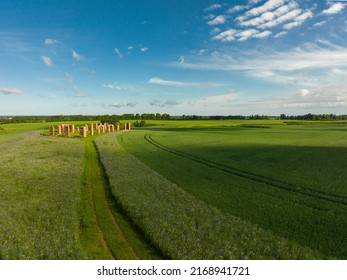 City Smiltene, Latvia. Flower Road To Old Brick Stonehenge Is A Popular Spot For People.