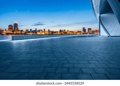 City Square floor and Shanghai skyline with modern buildings at night. Famous Bund buildings scenery in Shanghai.  - Powered by Shutterstock