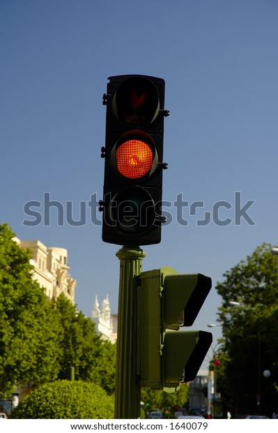 City stoplight in\
orange