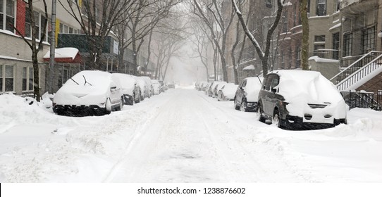 City Street Covered In Snow In Manhattan New York During Noreaster Snowstorm