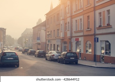 City Street With Parked Cars