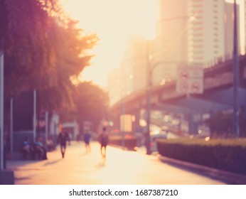 City Street With People Walking On Pedestrian Business Building Blur Background