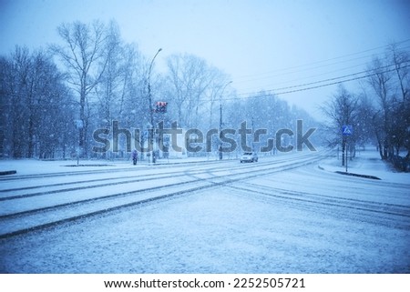 city street in snowfall background winter landscape abstract view