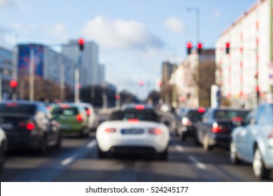 city street traffic and lights in berlin germany blurred background