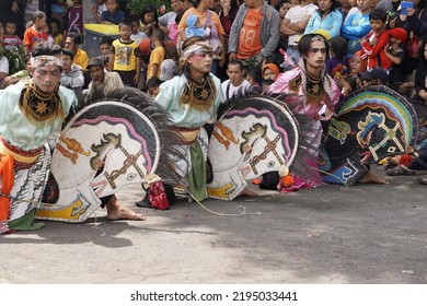 City Of Surabaya, State Of Indonesia. March 8, 2015. The Traditional Indonesian Dance Kuda Lumping Performer Dancing While In A Trance.