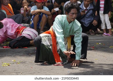 City Of Surabaya, State Of Indonesia. March 8, 2015. The Traditional Indonesian Dance Kuda Lumping Performer Dancing While In A Trance.