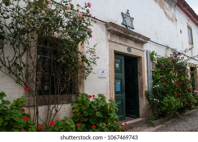 City Of Tomar, District Santarem, Portugal, May 26, 2017. Historic Center, Facade Of The Tomar Synagogue, Medieval Architecture, Great Architectural Heritage.