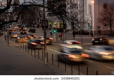 City traffic blurred moving cars in the evening - Powered by Shutterstock