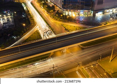 City traffic at crossroads at night
