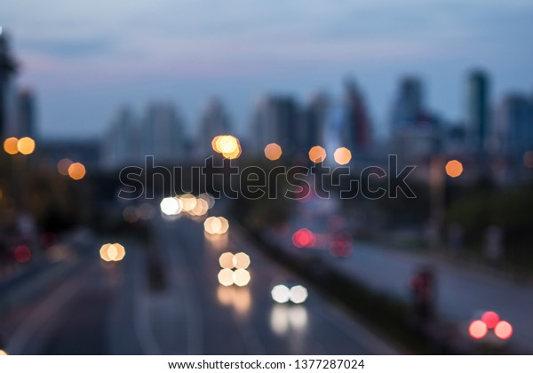 City traffic lights blurred round shapes great colors\
contrast pastel abstract round side by side perfect background\
image night lights traffic lights different interesting amazing buy\
now. 